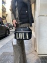 PANTALÓN LARGO CAMPANA CON ESTAMPADO GEOMÉTRICO