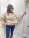 BLUSA DORADA